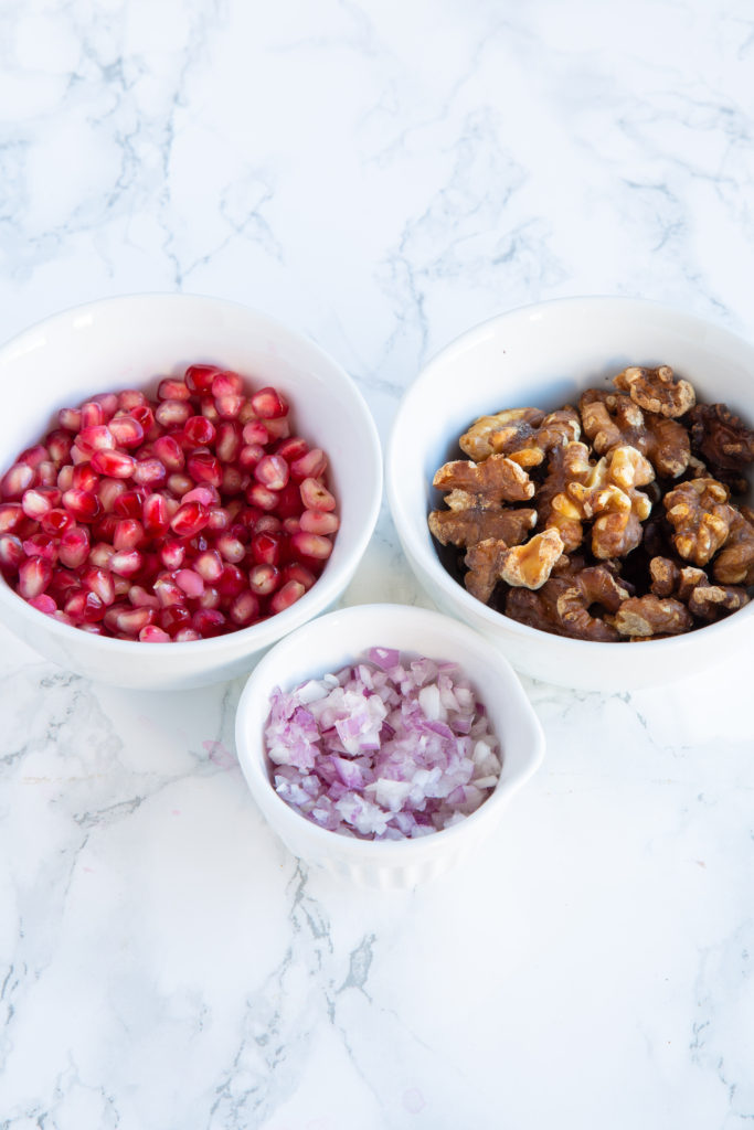 Pomegranate seeds, toasted walnuts, and minced shallots