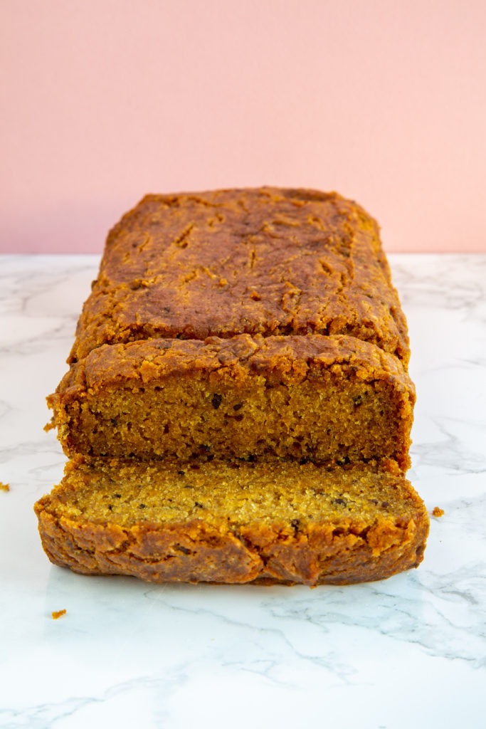 Sliced loaf of Fresh Vegan Pumpkin Bread