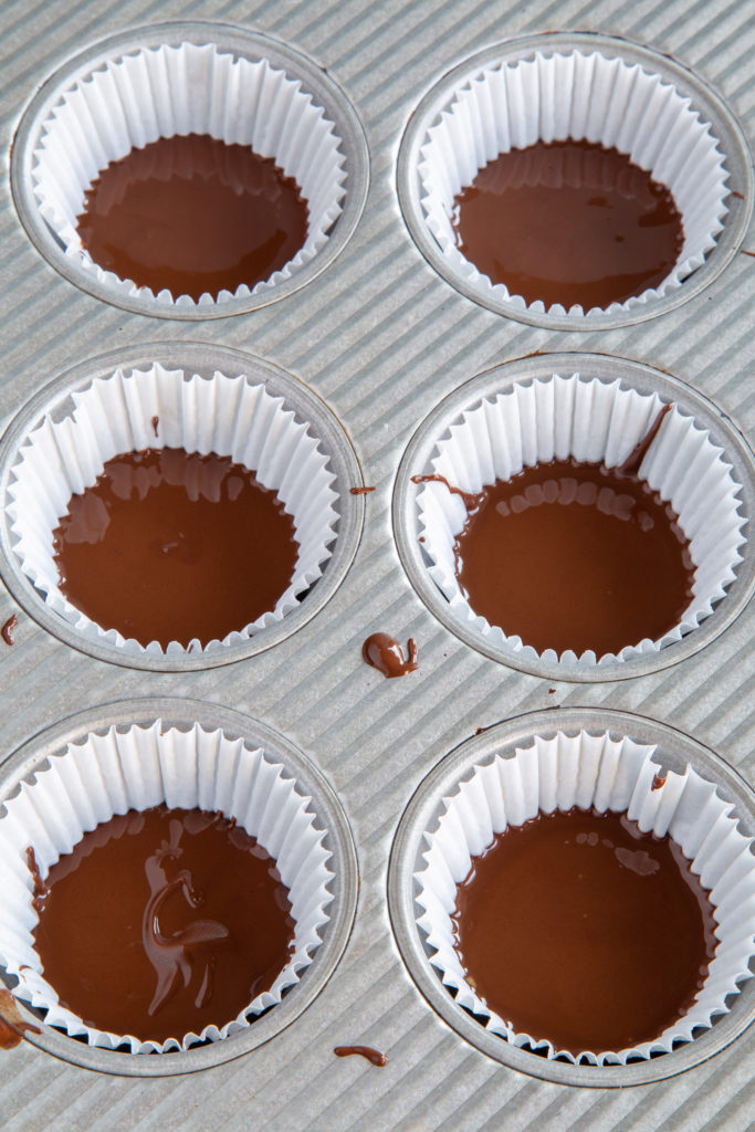 Final chocolate layer added for Homemade Peanut Butter Cups