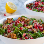 Two bowls of Healthy Pomegranate Quinoa Salad