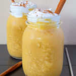 Healthy Pumpkin Spice Smoothies topped with coconut whipped cream